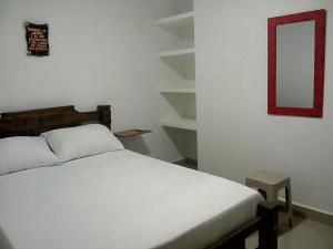 Postel nebo postele na pokoji v ubytování Hostal Casa de Barajas