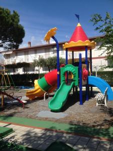 a playground with a colorful slide at Apparthotel Residence Riviera dei Cedri in Santa Maria del Cedro