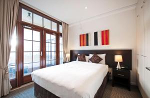 Ein Bett oder Betten in einem Zimmer der Unterkunft Quest Canberra
