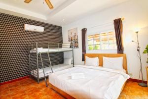 Postel nebo postele na pokoji v ubytování Grande Adam Private Pool Villa