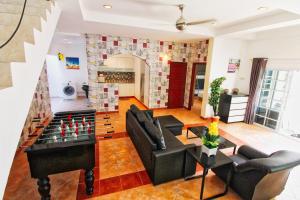 Posezení v ubytování Grande Adam Private Pool Villa
