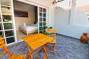 Balkón nebo terasa v ubytování Grande Adam Private Pool Villa