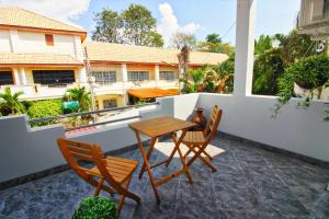 Balkón nebo terasa v ubytování Grande Adam Private Pool Villa