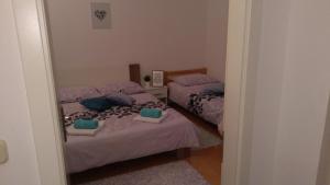 Postel nebo postele na pokoji v ubytování Guest House Adriatic