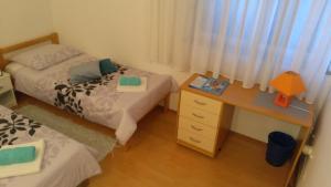 Postel nebo postele na pokoji v ubytování Guest House Adriatic