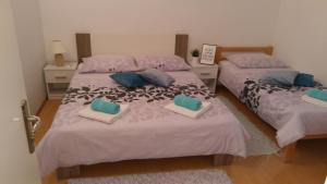 Postel nebo postele na pokoji v ubytování Guest House Adriatic