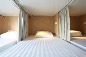 Letto o letti in una camera di RS II Guesthouse