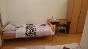 Postel nebo postele na pokoji v ubytování Guest House Adriatic