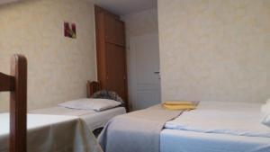 Un pat sau paturi într-o cameră la Zajazd nad Wisłą