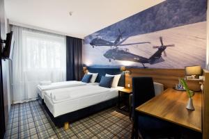 Łóżko lub łóżka w pokoju w obiekcie Hotel Polski