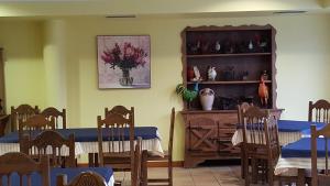 Reštaurácia alebo iné gastronomické zariadenie v ubytovaní Hotel Cortijo