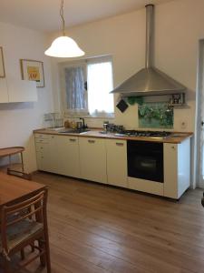 A kitchen or kitchenette at Villa Feltran