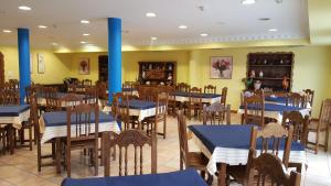 Reštaurácia alebo iné gastronomické zariadenie v ubytovaní Hotel Cortijo