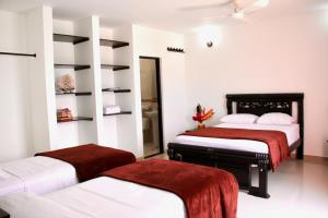 Cama o camas de una habitación en Hotel Calle Santodomingo