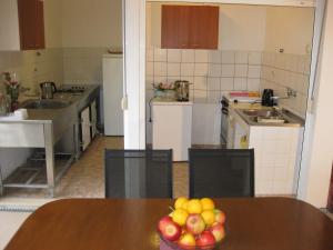 Kuchyňa alebo kuchynka v ubytovaní Marivo Guest House + 32 fotografií