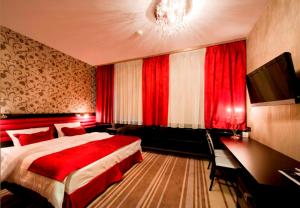 Postel nebo postele na pokoji v ubytování Hotel Symfonia Osjaków + 23 fotografií