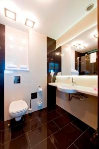 Vannituba majutusasutuses Hotel Symfonia Osjaków