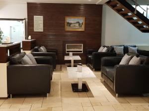 Χώρος καθιστικού στο Ashbourne House Hotel