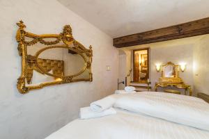 Postel nebo postele na pokoji v ubytování Arcadie Hotel & Apartments
