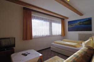 Postel nebo postele na pokoji v ubytování Haus Gariella