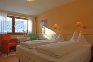 Una cama o camas en una habitación de Hotel - Restaurant Gosauerhof