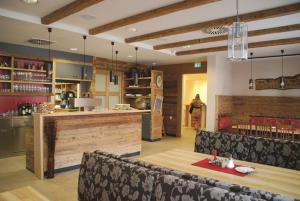 Lounge nebo bar v ubytování Da`Sporrer Hotel & Wirtshaus