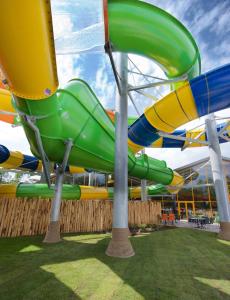 a colorful water slide at a water park at Vakantiepark Slagharen in Slagharen +58 photos