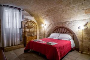 Postel nebo postele na pokoji v ubytování B&B Borgo San Martino