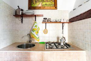 Kuchyň nebo kuchyňský kout v ubytování B&B Borgo San Martino