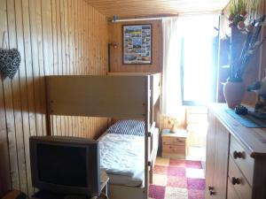 TV a/nebo společenská místnost v ubytování BTSD58002-FeWo-Stranddistel-III