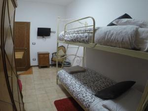 Postel nebo postele na pokoji v ubytování Alle vecchie mura