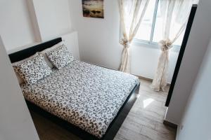 A bed or beds in a room at Mirador De Puerto