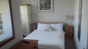 Voodi või voodid majutusasutuse St. Aiden's Guesthouse toas