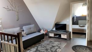 Posteľ alebo postele v izbe v ubytovaní Apartament Podkowa z widokiem na Giewont