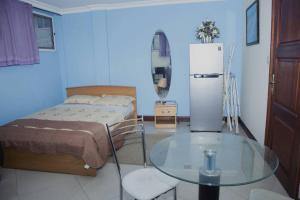Letto o letti in una camera di Ridge Over Suite