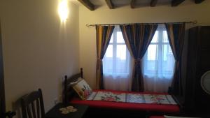 Postel nebo postele na pokoji v ubytování Guest House Strumena
