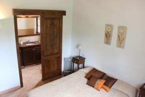 Łóżko lub łóżka w pokoju w obiekcie Casa con jardín y piscina - MORELL ONZE