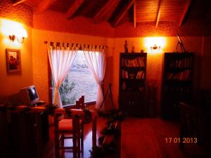 Posezení v ubytování Hosteria Rukahué