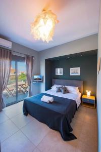 Posteľ alebo postele v izbe v ubytovaní Villa Oliva Rodos + 31 fotografií