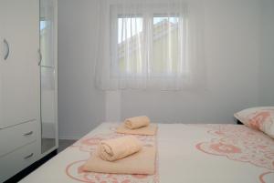Posteľ alebo postele v izbe v ubytovaní Holiday Home Luka