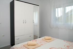 Posteľ alebo postele v izbe v ubytovaní Holiday Home Luka