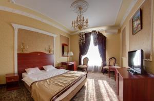 Un ou plusieurs lits dans un hébergement de l'établissement *Pirosmani Hotel