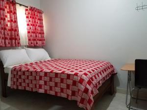 Postel nebo postele na pokoji v ubytování Sharp Guesthouse