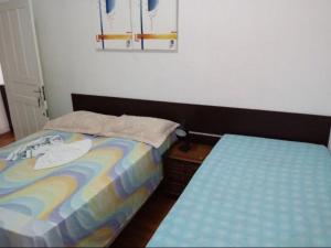 Cama ou camas em um quarto em Pousada Villas