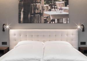 Postel nebo postele na pokoji v ubytování Guesthouse Suiteseven