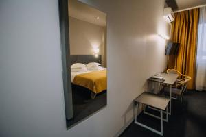 Postel nebo postele na pokoji v ubytování Centrum Hotel Viljandi