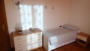 Posteľ alebo postele v izbe v ubytovaní SUPERCASONA pratica