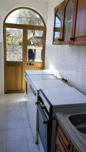 Kuchyň nebo kuchyňský kout v ubytování Guesthouse Kodre