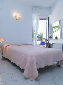 Ένα ή περισσότερα κρεβάτια σε δωμάτιο στο Hotel Loreley