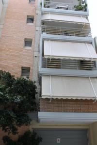 A balcony or terrace at Cozy studio apartment in PIREUS